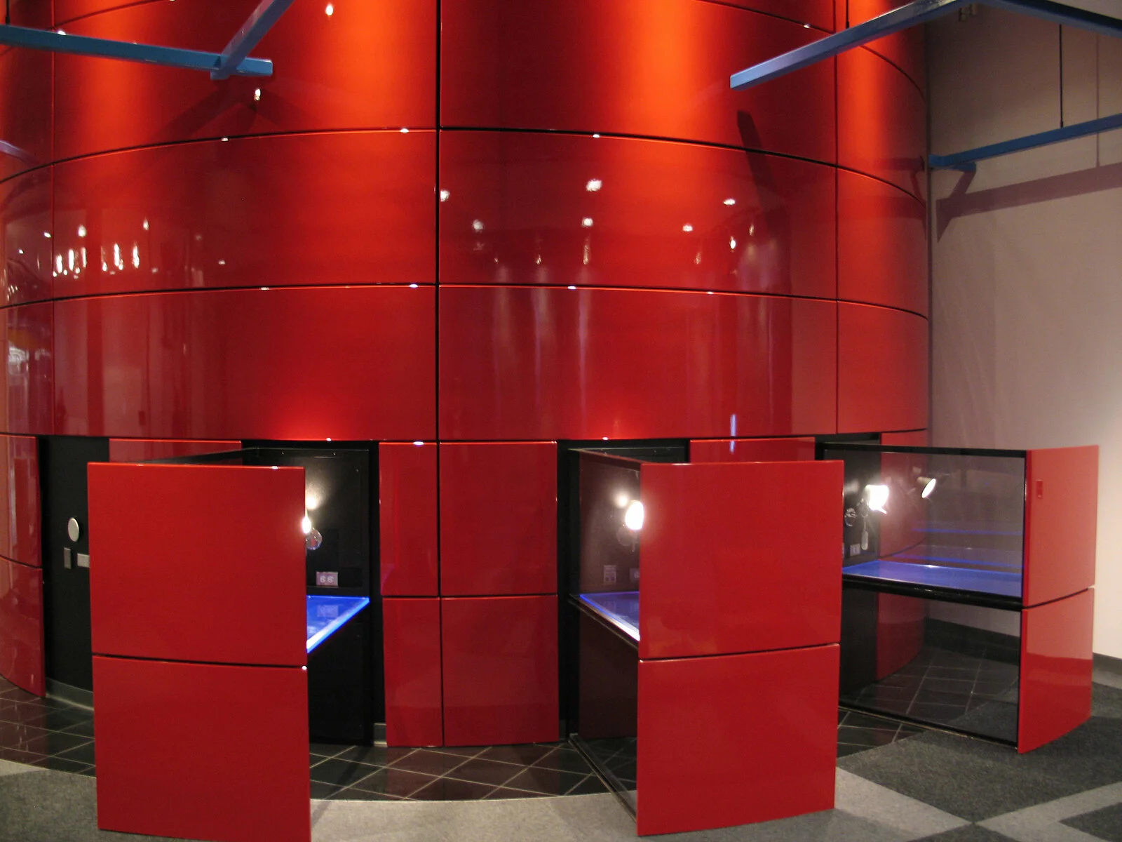 interior Equinix building modern red built in desks.