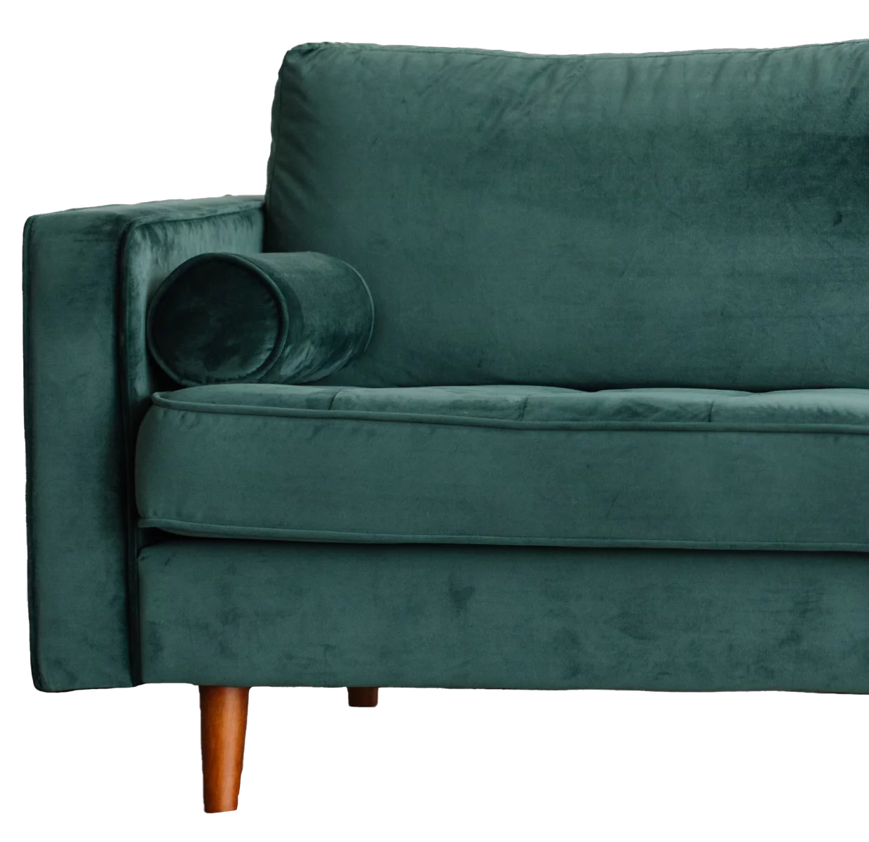 photo of green velvet couch.