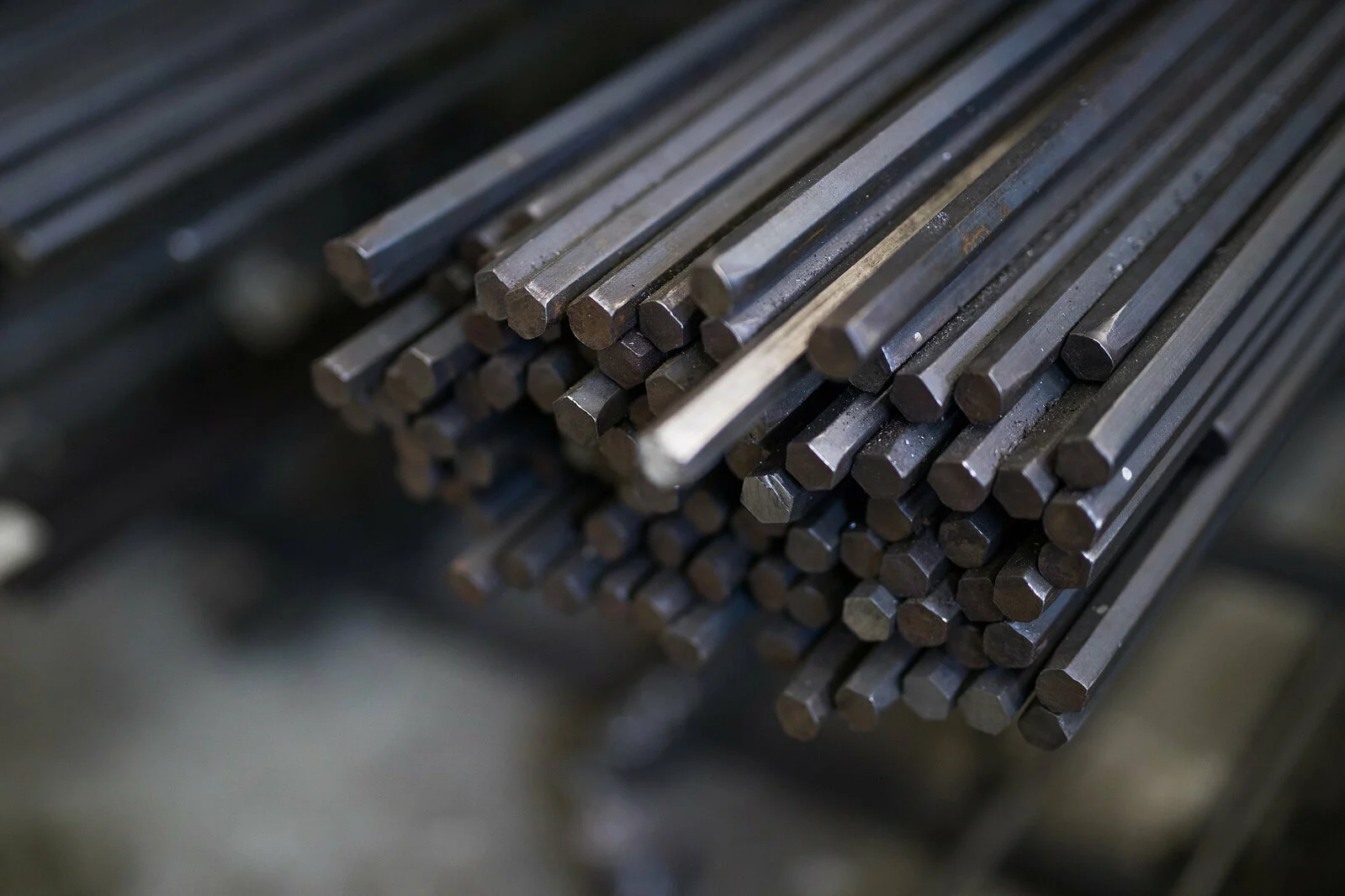 close up of metal rods stacked together.