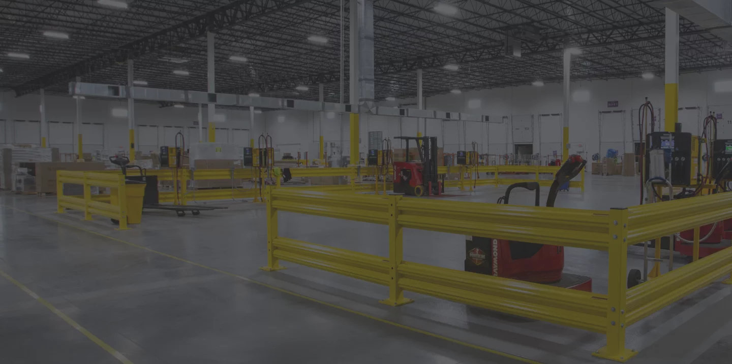 Interior distribution warehouse, yellow bumpers, work benches.